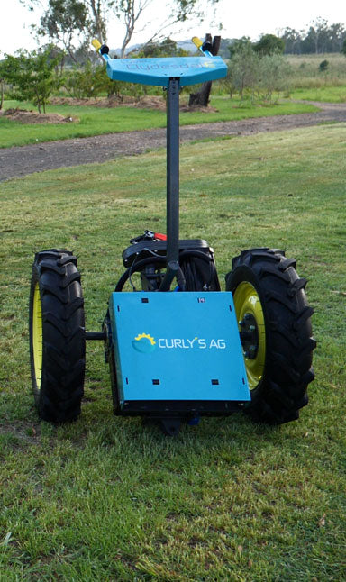 Cyber Clydesdale electric tractor with implement attached
