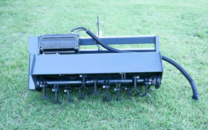 Flail mower mounted to the electric tractor drive unit