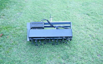 Flail mower clearing overgrown ground