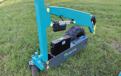 Hand-E T Trade loader working around a shed