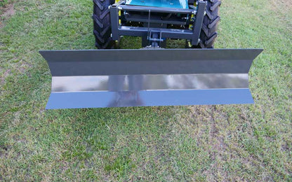 Front mounted blade on an electric two-wheel tractor