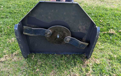 Slasher mounted to an electric tractor